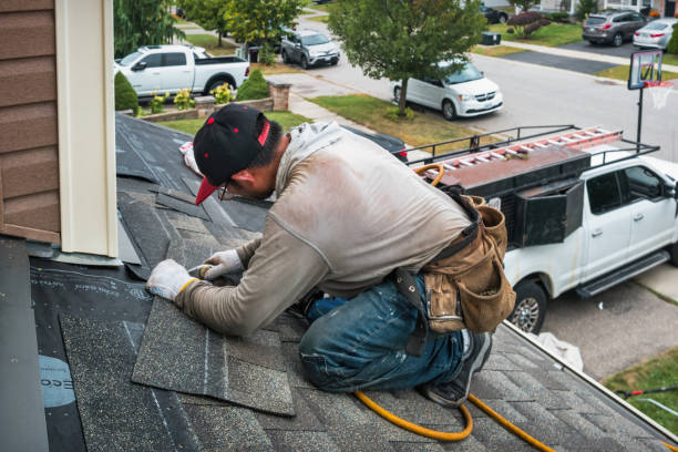 Professional Roofing technician working in Plainville, CT